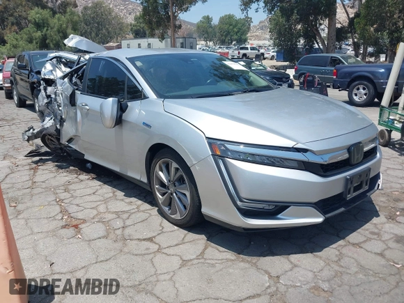 2018 Honda Clarity Touring z VIN JHMZC5F31JC021516, wystawiony jako IAAI lot #42478787 z przebiegiem 87 519 mil mil oraz . Historia ofert i sprzedaży dostępna na DreamBid. Obrazek 1.