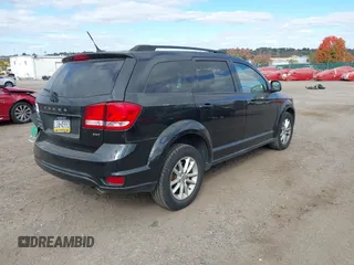 2013 Dodge Journey SXT with VIN 3C4PDDBG7DT553130, listed as a IAAI auction lot 40570369 with Not Provided miles and . Bid and sale history available at DreamBid. Image 4.