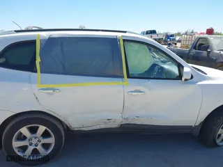 2009 Hyundai Santa Fe SE with VIN 5NMSH13E09H265061, listed as a IAAI auction lot 41851575 with 136,460 mi miles. Bid and sale history available at carsss.com. Image 13.
