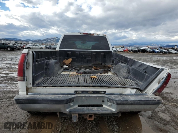 1999 Chevrolet Silverado 3500 z VIN 1GCHC33J2XF087634, wystawiony jako Copart lot #58106714 z przebiegiem 205 431 mil mil oraz Czysty tytuł • Clean title. Historia ofert i sprzedaży dostępna na DreamBid. Obrazek 6.