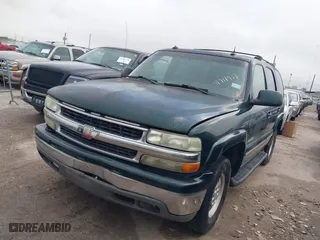 2003 Chevrolet Tahoe LT with VIN 1GNEC13Z03R268258, listed as a IAAI auction lot 41916956 with 218,720 mi miles. Bid and sale history available at carsss.com. Image 2.