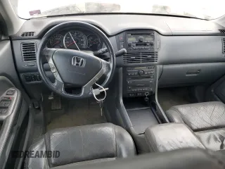 2005 Honda Pilot EX-L z VIN 5FNYF18635B053929, wystawiony jako Copart lot #82058334 z przebiegiem 311 568 mil mil oraz Czysty tytuł • Clean title. Historia ofert i sprzedaży dostępna na DreamBid. Obrazek 8.