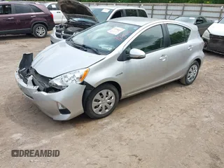 2014 Toyota Prius One z VIN JTDKDTB35E1061058, wystawiony jako IAAI lot #42156011 z przebiegiem 105 196 mil mil oraz . Historia ofert i sprzedaży dostępna na DreamBid. Obrazek 2.