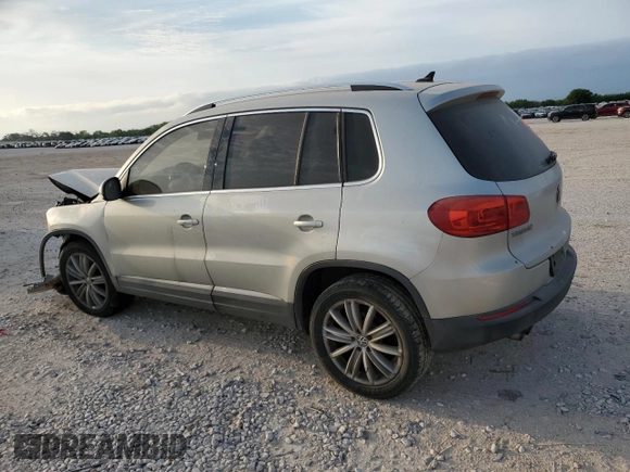 2012 Volkswagen Tiguan SEL with VIN WVGAV7AX2CW529098, listed as a Copart auction lot 53349565 with 128,603 mi miles and Salvage Title. Bid and sale history available at DreamBid. Image 2.