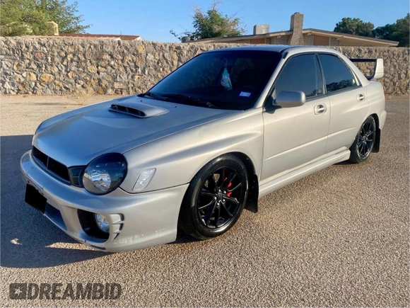 2003 Subaru Impreza WRX с VIN JF1GD29633G512374, выставлен на аукционе Copart как лот 58000895 с пробегом 186 725 миль миль и Чистый • Clean title. История ставок и продаж доступна на DreamBid. Изображение 2.