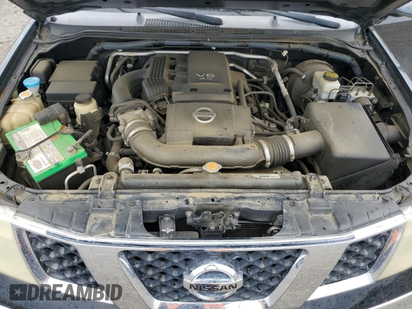 2008 Nissan Frontier SE z VIN 1N6AD07U28C442383, wystawiony jako Copart lot #52042495 z przebiegiem 137 155 mil mil oraz Szkoda całkowita • Salvage title. Historia ofert i sprzedaży dostępna na DreamBid. Obrazek 13.