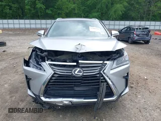 2016 Lexus RX 350 z VIN 2T2ZZMCA5GC002315, wystawiony jako IAAI lot #42107312 z przebiegiem 156 339 mil mil oraz . Historia ofert i sprzedaży dostępna na DreamBid. Obrazek 13.