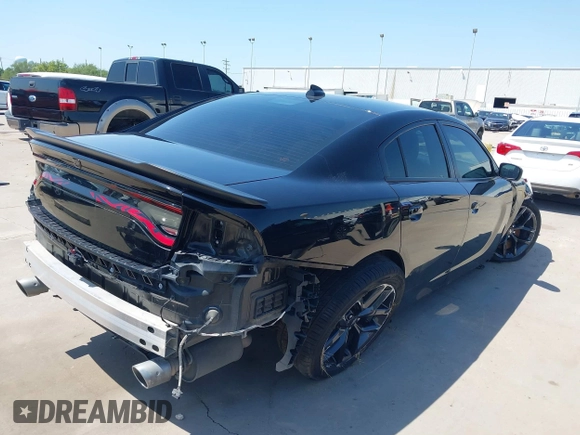 2021 Dodge Charger R/T with VIN 2C3CDXCT4MH684900, listed as a IAAI auction lot 41992358 with 71,386 mi miles and . Bid and sale history available at DreamBid. Image 4.