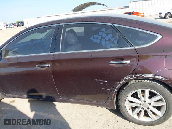 2013 Toyota Avalon XLE with VIN 4T1BK1EB6DU039057, listed as a IAAI auction lot 42011057 with 127,313 mi miles and . Bid and sale history available at DreamBid. Image 15.
