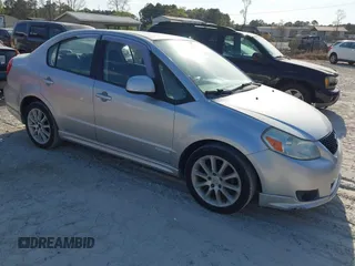 2008 Suzuki SX4 Convenience z VIN JS2YC415X85100378, wystawiony jako IAAI lot #41904682 z przebiegiem 130 164 mil mil oraz . Historia ofert i sprzedaży dostępna na DreamBid. Obrazek 1.