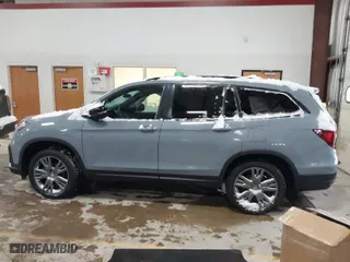 2022 Honda Pilot Sport with VIN 5FNYF6H33NB035854, listed as a IAAI auction lot 41394963 with 62,773 mi miles. Bid and sale history available at carsss.com. Image 14.