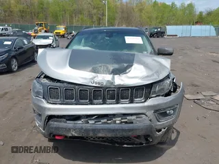 2020 Jeep Compass Trailhawk with VIN 3C4NJDDB4LT171685, listed as a IAAI auction lot 42168366 with 76,390 mi miles and . Bid and sale history available at DreamBid. Image 6.