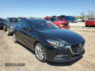 2017 Mazda 3 Touring with VIN JM1BN1V7XH1111943, listed as a Copart auction lot 51472744 with 121,100 mi miles and Salvage Title. Bid and sale history available at DreamBid. Image 4.