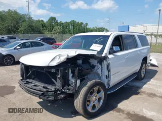 2020 Chevrolet Suburban Premier with VIN 1GNSCJKC9LR125292, listed as a IAAI auction lot 42073858 with 92,363 mi miles and . Bid and sale history available at DreamBid. Image 6.