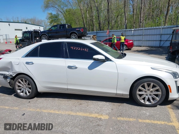 2015 Cadillac CTS Luxury AWD with VIN 1G6AX5SX5F0103725, listed as a IAAI auction lot 42226485 with 112,437 mi miles and . Bid and sale history available at DreamBid. Image 13.