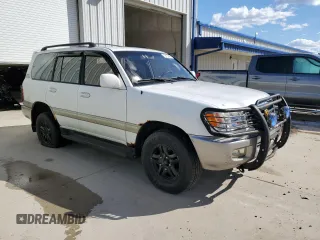 1999 Toyota Land Cruiser with VIN JT3HT05J3X0068111, listed as a Copart auction lot 72815044 with 185,043 mi miles and Clean Title. Bid and sale history available at carsss.com. Image 4.