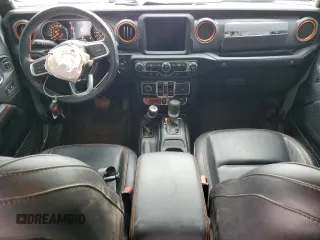 2023 Jeep Gladiator Mojave z VIN 1C6JJTEG9PL587727, wystawiony jako Copart lot #66034185 z przebiegiem 28 776 mil mil oraz Szkoda całkowita • Salvage title. Historia ofert i sprzedaży dostępna na DreamBid. Obrazek 8.
