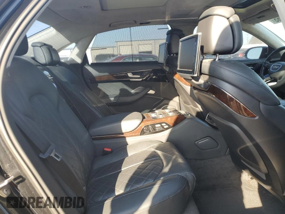 2015 Audi A8 L 4.0T with VIN WAU32AFD0FN016733, listed as a Copart auction lot 48564865 with 102,581 mi miles and Salvage Title. Bid and sale history available at carsss.com. Image 10.