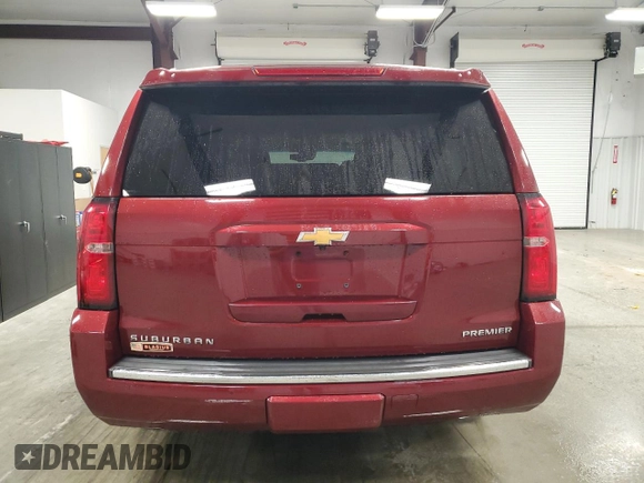 2019 Chevrolet Suburban Premier with VIN 1GNSKJKC6KR293389, listed as a Copart auction lot 77700264 with 49,057 mi miles and Salvage Title. Bid and sale history available at DreamBid. Image 6.