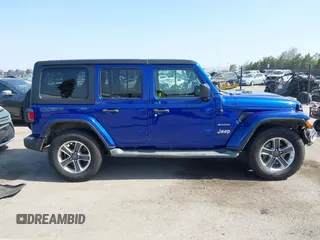 2018 Jeep Wrangler Unlimited Sahara z VIN 1C4HJXEG2JW211116, wystawiony jako IAAI lot #42250718 z przebiegiem 67 771 mil mil oraz . Historia ofert i sprzedaży dostępna na DreamBid. Obrazek 13.