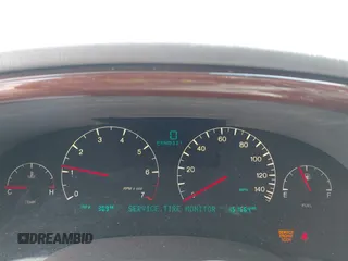 2002 Cadillac DeVille DTS with VIN 1G6KF57972U262315, listed as a IAAI auction lot 41537606 with 151,664 mi miles. Bid and sale history available at carsss.com. Image 7.
