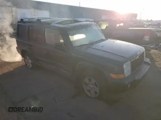 2006 Jeep Commander with VIN 1J8HH48N86C128361, listed as a Copart auction lot 77609564 with 142,660 mi miles and Clean Title. Bid and sale history available at carsss.com. Image 4.