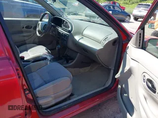 2000 Ford Contour SE Fleet z VIN 1FAFP66L2YK119281, wystawiony jako IAAI lot #42797519 z przebiegiem 46 808 mil mil oraz . Historia ofert i sprzedaży dostępna na DreamBid. Obrazek 5.