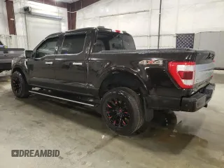 2021 Ford F-150 XL with VIN 1FTFW1E8XMFA60626, listed as a Copart auction lot 59410735 with 95,684 mi miles and Salvage title. Bid and sale history available at DreamBid. Image 2.