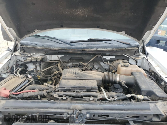 2010 Ford F-150 XL with VIN 1FTMF1CW2AFC54023, listed as a Copart auction lot 57428195 with 183,892 mi miles and Salvage title. Bid and sale history available at DreamBid. Image 11.