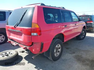 1998 Mitsubishi Montero LS z VIN JA4MT31P8WP018486, wystawiony jako IAAI lot #42076950 z przebiegiem 151 471 mil mil oraz . Historia ofert i sprzedaży dostępna na DreamBid. Obrazek 4.