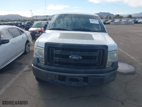 2014 Ford F-150 XL with VIN 1FTMF1CM3EKG36797, listed as a IAAI auction lot 40892574 with 136,417 mi miles. Bid and sale history available at carsss.com. Image 11.