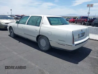 1999 Cadillac DeVille DHS z VIN 1G6KE54Y3XU714363, wystawiony jako IAAI lot #42257217 z przebiegiem 287 542 mil mil oraz . Historia ofert i sprzedaży dostępna na DreamBid. Obrazek 3.