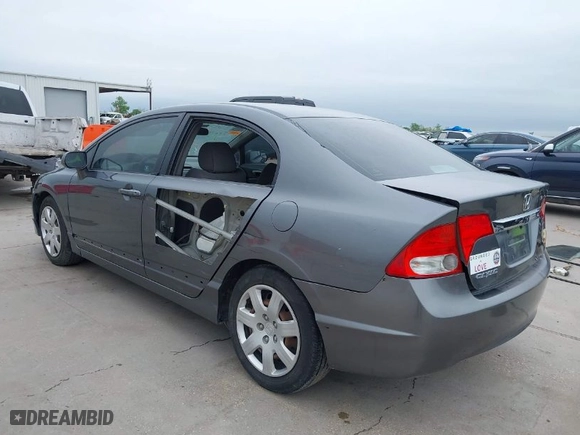 2010 Honda Civic Sdn LX with VIN 2HGFA1F59AH326975, listed as a IAAI auction lot 41953281 with 214,910 mi miles. Bid and sale history available at carsss.com. Image 3.