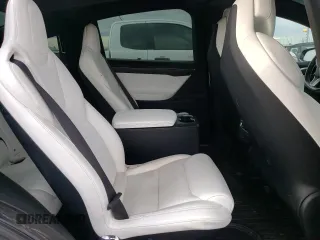 2017 Tesla Model X 90D z VIN 5YJXCBE2XHF060912, wystawiony jako Copart lot #85946834 z przebiegiem 135 277 mil mil oraz Szkoda całkowita • Salvage title. Historia ofert i sprzedaży dostępna na DreamBid. Obrazek 11.