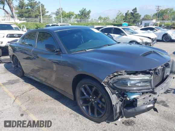 2019 Dodge Charger R/T z VIN 2C3CDXCT7KH527732, wystawiony jako IAAI lot #42283453 z przebiegiem 99 755 mil mil oraz . Historia ofert i sprzedaży dostępna na DreamBid. Obrazek 1.
