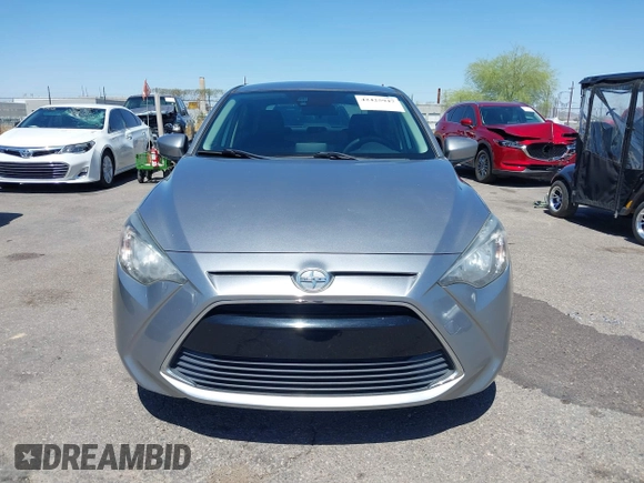 2016 Scion iA z VIN 3MYDLBZV1GY132561, wystawiony jako IAAI lot #42425947 z przebiegiem 94 882 mil mil oraz . Historia ofert i sprzedaży dostępna na DreamBid. Obrazek 13.