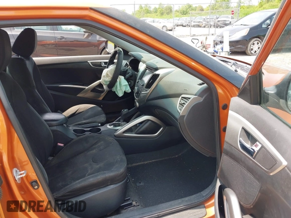 2012 Hyundai Veloster w/Gray Int с VIN KMHTC6AD0CU043402, выставлен на аукционе IAAI как лот 42406321 с пробегом 116 734 миль миль и . История ставок и продаж доступна на DreamBid. Изображение 5.