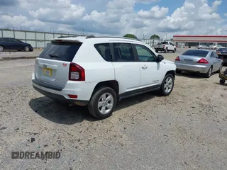 2016 Jeep Compass Sport with VIN 1C4NJCBA0GD742797, listed as a IAAI auction lot 42177186 with 128,665 mi miles and . Bid and sale history available at DreamBid. Image 4.