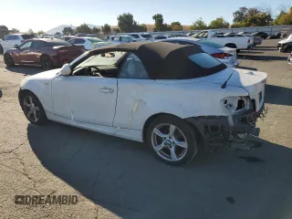 2013 BMW 1 Series 128i z VIN WBAUN1C57DVR01730, wystawiony jako Copart lot #75362744 z przebiegiem Nie podano mil oraz Szkoda całkowita • Salvage title. Historia ofert i sprzedaży dostępna na DreamBid. Obrazek 2.