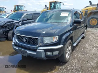 2011 Honda Ridgeline RTL with VIN 5FPYK1F54BB011472, listed as a IAAI auction lot 42112512 with 194,974 mi miles and . Bid and sale history available at DreamBid. Image 2.