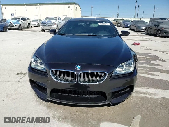 2014 BMW M6 z VIN WBS6C9C51EDV73883, wystawiony jako Copart lot #76395574 z przebiegiem 57 995 mil mil oraz Czysty tytuł • Clean title. Historia ofert i sprzedaży dostępna na DreamBid. Obrazek 14.