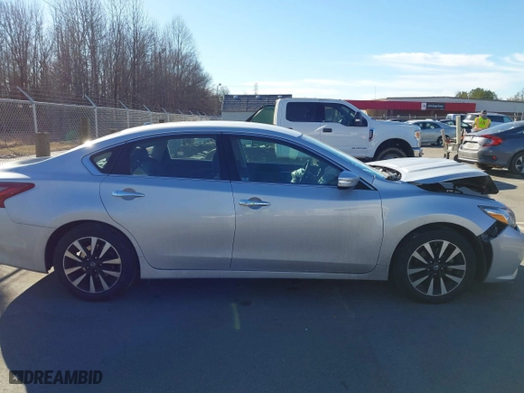 2018 Nissan Altima 2.5 SV with VIN 1N4AL3AP9JC158108, listed as a IAAI auction lot 41464382 with 123,129 mi miles. Bid and sale history available at carsss.com. Image 13.