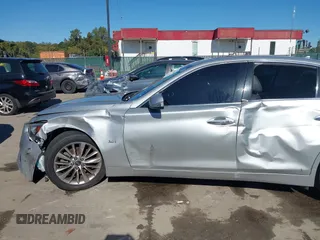 2020 Infiniti Q50 Luxe with VIN JN1EV7AR6LM256477, listed as a IAAI auction lot 40631166 with 89,908 mi miles and . Bid and sale history available at DreamBid. Image 17.