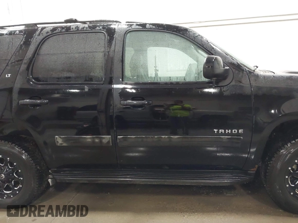 2013 Chevrolet Tahoe LT with VIN 1GNSKBE07DR305706, listed as a IAAI auction lot 42004594 with 166,020 mi miles and . Bid and sale history available at DreamBid. Image 13.