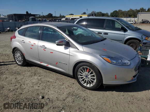 2014 Ford Focus Electric with VIN 1FADP3R45EL287285, listed as a Copart auction lot 74148154 with 64,543 mi miles and Salvage title. Bid and sale history available at DreamBid. Image 4.