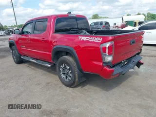 2021 Toyota Tacoma SR z VIN 5TFCZ5AN2MX263159, wystawiony jako IAAI lot #42273087 z przebiegiem 69 220 mil mil oraz . Historia ofert i sprzedaży dostępna na DreamBid. Obrazek 3.