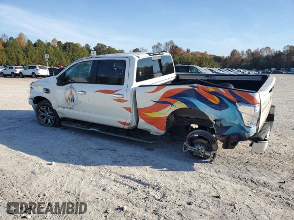 2019 Nissan Titan XD SL with VIN 1N6BA1F43KN511419, listed as a Copart auction lot 77875274 with 27,447 mi miles and Salvage Title. Bid and sale history available at carsss.com. Image 2.