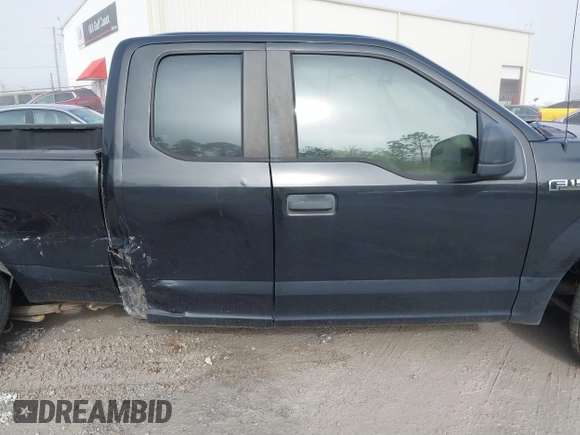 2015 Ford F-150 XL with VIN 1FTEX1CF2FKD12874, listed as a IAAI auction lot 41860610 with 242,215 mi miles. Bid and sale history available at carsss.com. Image 14.