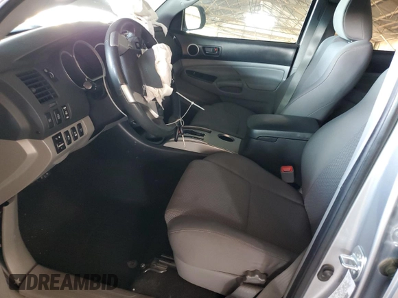 2014 Toyota Tacoma with VIN 5TFLU4EN3EX086738, listed as a Copart auction lot 56494585 with 140,456 mi miles and Salvage Title. Bid and sale history available at DreamBid. Image 7.