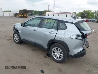2023 Toyota Corolla Cross L with VIN 7MUAAABG4PV063424, listed as a IAAI auction lot 42119578 with 14,743 mi miles and . Bid and sale history available at DreamBid. Image 3.